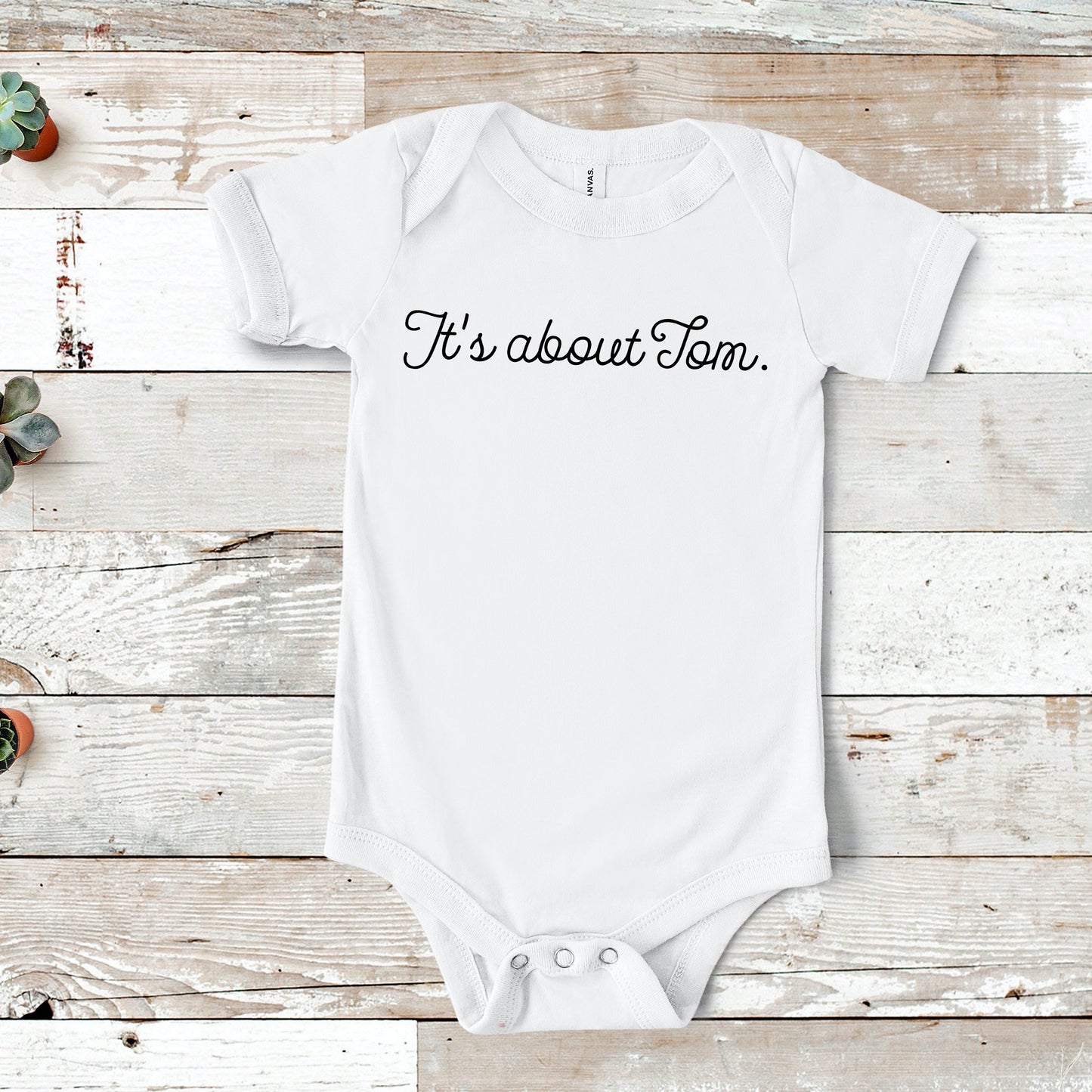 It's About Tom | RHONY Baby One Piece